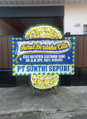 Papan Bunga Duka di Wegee Bino