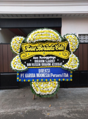 Papan Bunga Duka di Wegee Bino