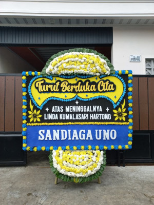 Papan Bunga Duka di Wegee Bino